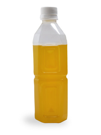 A bottle of fresh orange juice, cut out isolated on whiteの写真素材
