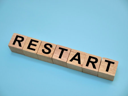 Restart, text written on wooden block, business term conceptの写真素材