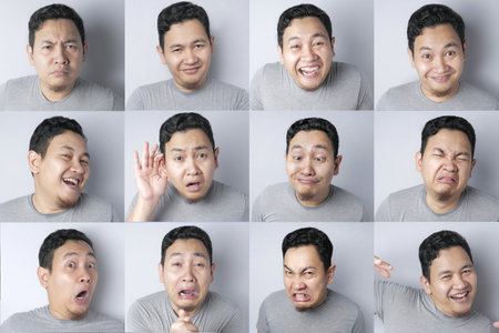 Funny Asian male with various face expressions, happy, smile, laugh, angry, hurt, crying in set collagesの写真素材
