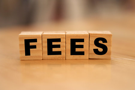Fees, text written on wooden block, business term conceptの写真素材