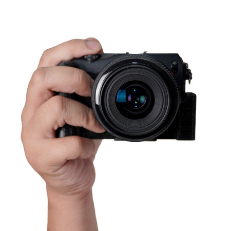 Male person photographer hand holding mirrorless camera, cut out isolated on whiteの写真素材