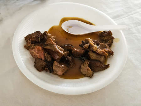 Grill beef with fried fries, Costlow, and vegetable in the white plate on the wooden table.visible noise due to high ISOの写真素材