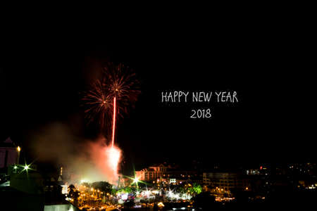 Blur image of New Year Eve Fireworks Display Show with word happy new year . soft focus,motion blur...