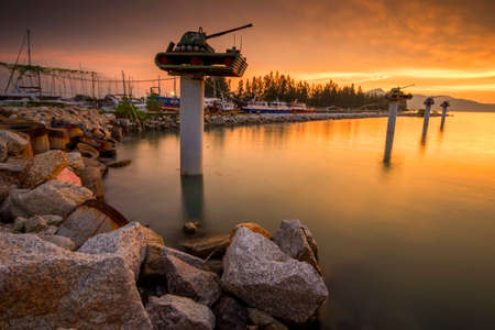 Beautiful view of sunset at Lumut,Perak,Malaysia. soft focus, blur due to long exposure. Visible noise due to high ISO.の写真素材