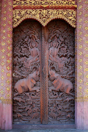 Wood carving temple doorの写真素材