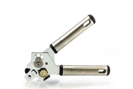Close up shot of Silver metal tin opener on isolate white background.の写真素材