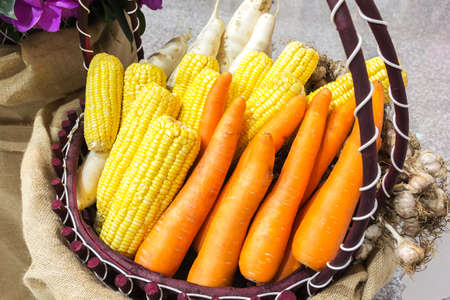 Multiple different vegetables in a basket.の写真素材
