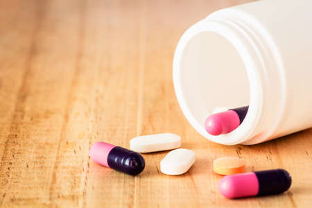 Close up shot Pour a bottle of pills