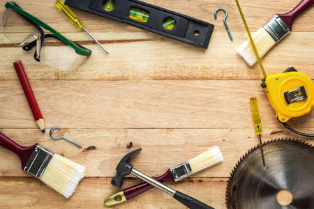 Carpenter tools on wood board, Use for as backgroundの写真素材