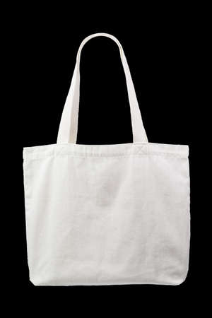 A photo of white cloth bag on isolate black backgroundの写真素材