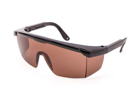 A photo of black safety goggle on isolate white background with clipping pathの写真素材