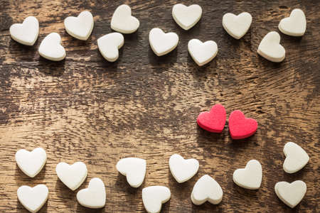 A photo of small heart on wood texture