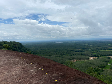 View from the top of the mountain to the jungle and the skyの写真素材