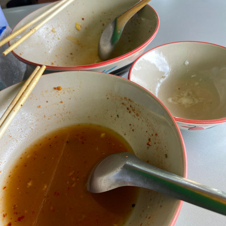 Chopsticks and bowl of soup on the table, stock photoの写真素材