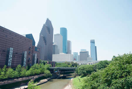 The canal and walkway in Houston, Texas with modern buildings in the backgroundのeditorial素材