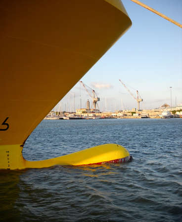 Detail of a ship , the bow and the dock in backgroundの写真素材