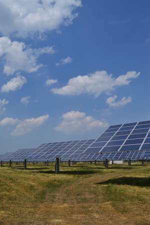 Solar panels on green grassの写真素材