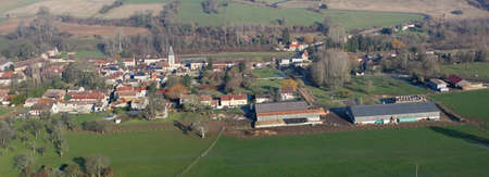 Panorama of Chaussy en Vexin seen from the sky, a small rural village with its agricultural farm, in Val-d'Oise department (95710); Ile-de-France region, France - January 03, 2010の写真素材