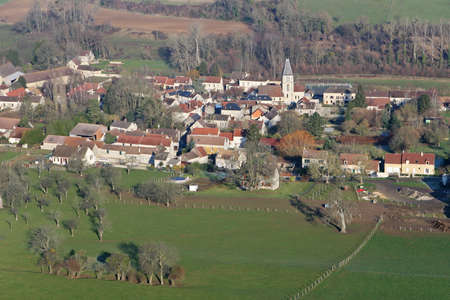 Aerial view of Chaussy en vexin, a small rural French village in Vexin with its church, in the Val-d'Oise department (95710); Ile-de-France region, France - January 03, 2010の写真素材