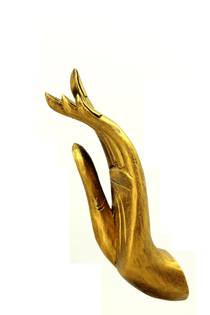 Golden hand Buddha statue の写真素材