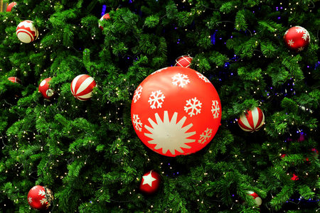 Decorated green christmas tree with ball の写真素材