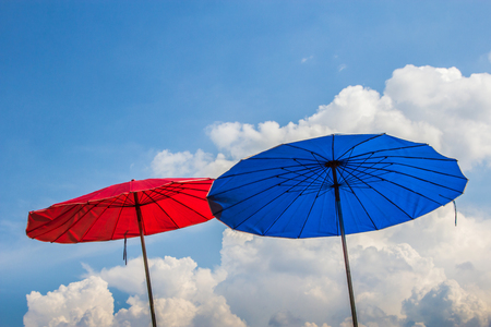 colorful umbrellas on blue sky backgroundの写真素材