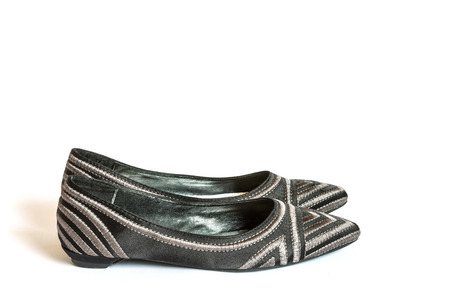 women leather black shoes on white backgroundの写真素材