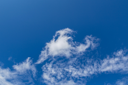 white clouds on blue sky backgroundの写真素材