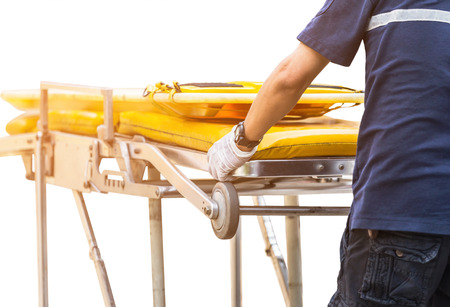 paramedic and rescue stretcher to transport patient on white backgroundの写真素材