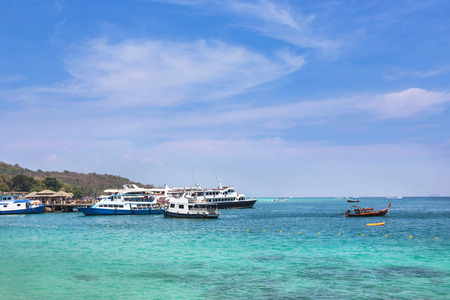 Cruising ships and boats moored in andaman sea at Phi Phi Don island , Thailandのeditorial素材