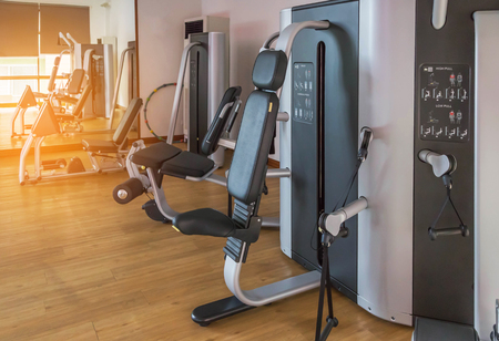 health exercise equipment facility service for bodybuilding in modern fitness center gym room...