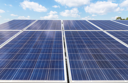 Close up rows array of polycrystalline silicon solar cells or photovoltaics in solar power plant...