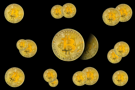 Golden bitcoin coins digital cryptocurrency isolate on black background Business concept.の写真素材