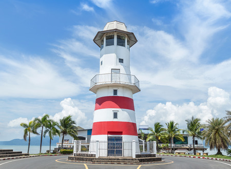 Public red and white lighthouse at Laem Ngob Trat in sunny day with blue skyのeditorial素材