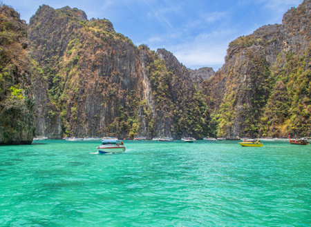 Landscape view of  Pileh bay blue lagoon with limestone rock surrounded, popular bay at phi phi island ,Krabi,Thailand.の写真素材