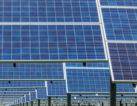 Close up rows array of Solar panels or photovoltaics in solar power station convert light energy...
