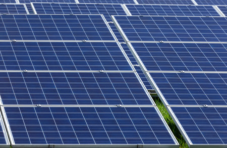 Close up rows array of solar panels polycrystalline silicon or photovoltaic cells in solar power plant station Alternative technology for energy revolutionの写真素材