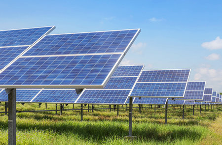 Close up rows array of Solar panels or photovoltaics in solar power station convert light energy from the sun , alternative clean energy  environmentally friendlyの写真素材