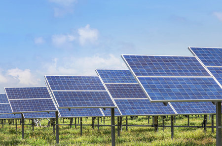 Close up rows array of Solar panels or solar cells or photovoltaics in solar power station alternative clean renewable energy efficiency sustainableの写真素材