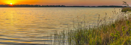 Sunset on a beautiful lake near Kiev, Ukraine.の写真素材