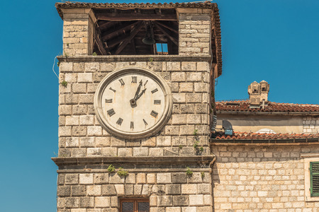 The Clock Tower on the Square of Arms in the Old Town of Kotor, Montenegro.の写真素材