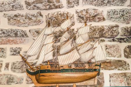 Budva, Montenegro - August 20, 2017: Model of a wooden medieval sailing ship in the library-museum of the old town of Budva, Montenegro.のeditorial素材