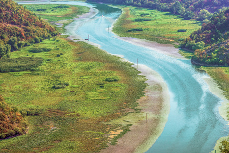 Montenegro majestic landscape - Crnojevica river bending in Skadar Lake National Park.