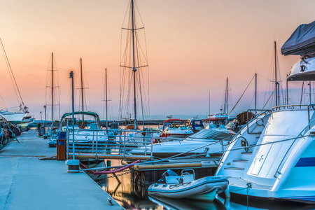 Boats and yachts on the quay in the seaport of Sozopol, Bulgaria.の写真素材