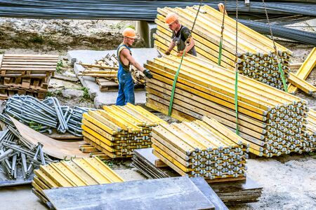 Kiev, Ukraine - June 22, 2018: workers are working on a construction site. Concrete construction works.のeditorial素材