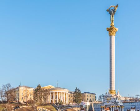 Kiev, Ukraine - January 3, 2020: View of the Independence Monument - a triumphal column dedicated to the independence of Ukraine. In the background is the International Center for Culture and Arts.のeditorial素材