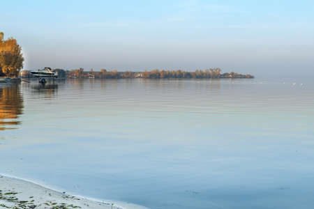 Beautiful autumn sunset on the banks of the Dnieper river.