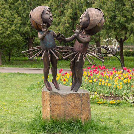 Beautiful metal sculpture in a spring park - the zodiac sign "Gemini".のeditorial素材