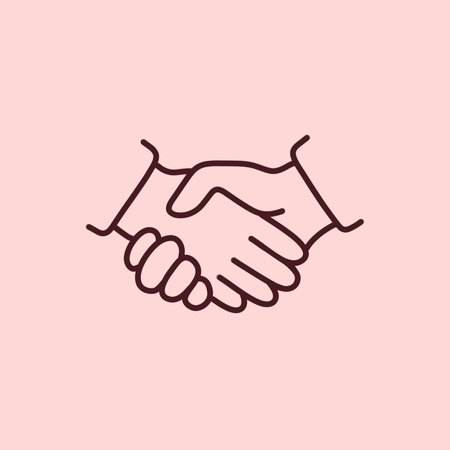 The picture shows a strong male handshakeの写真素材