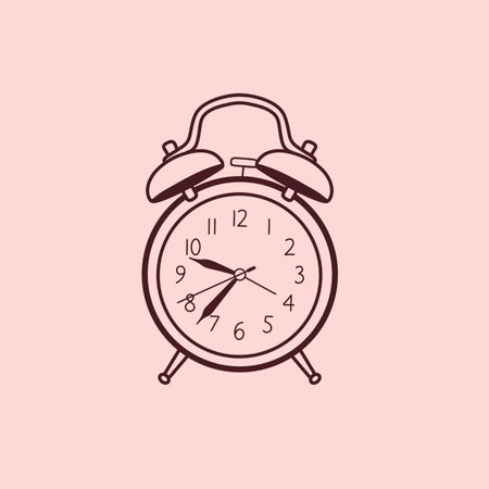 The picture shows the icon of a classic alarm clock with Arabic letters on small legsの写真素材